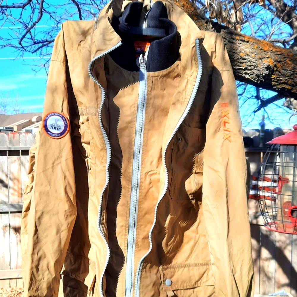 Super bowl XLIX jacket with Super Bowl Transportation pin. Never worn.